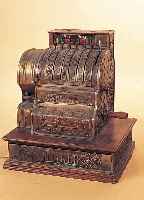REGISTRIERKASSE, ANKER, UM 1910-20, WEIßGUßGEHäUSE REICH RELIEFIERT, H. CA. 59 CM, LEICHT BESCH., FUNKTION NICHT GEPRüFT