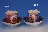 TASSE MIT UNTERTASSE, VOLKSTEDT, UM 1860, PORZELLAN, ROSEFARBENER FOND, MIT REICHEN BLUMENBOUQUETS BEMALT, TASSE MIT UNTERTASSE MIT JE EINER ...