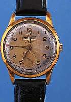CAMY HERRENARMBANDUHR AUTOMATIK, SCHWEIZ UM 1952, METALL VERG. BER., EDELST.-BODEN U. GLASR. GEDR., VOLLKALENDERANZ. AUßER MOND- PHASE, ...
