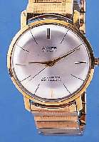 KONVOLUT: 2 ANKER HERRENARMBANDUHREN FüR DEN DEUTSCHEN MARKT, UM 1964, BEIDE GG 585/000, METALLZUGGLIEDERBäNDER M. GG-AUFLAGE SPäTER/ SEK., 1X ...