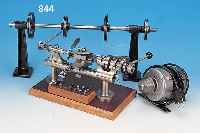 DREHMASCHINE FüR UHRMACHER, WOHL DT., UM 1930/40, AUF HOLZSOCKEL MONTIERT MIT GROSSEM VORGELEGE U. ELEKTR. MOTOR (GEPRüFT, INTAKT), ...