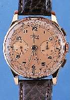 TITUS ARMBANDCHRONOGRAPH, REF.-NR. 418307, SCHWEIZ UM 1947, RG 750/000, BODEN U. GLASR. GEDR., METALLCUV. ZUR ARMIERUNG, ORIG. VERG. BLATT, ...