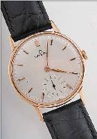 OMEGA HERRENARMBANDUHR, REF.-NR. 10642995, SCHWEIZ UM 1949, RG 585/000, BODEN U. GLASR. GEDR., BLATT REST., 17 ST., HANDAUFZUGKAL. 28,KOMP.-UNR., ...