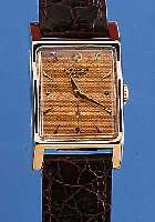 LONGINES HERRENARMBANDUHR, REF.-NR. 7537, SCHWEIZ/USA UM 1954, GG 585/000, AUFWEND. RECT.-FORM, BODEN GEDR., GUILL. U. VERS. BLATTM. AUFGEL. ...