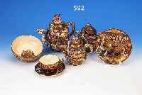 TEESERVICE, JAPAN, SATSUMA, UM 1910, STEIN- GUT, BUNTE BEMALUNG, REICHE GOLDSTAFFAGE, PERSONEN U. GLüCKSSYMBOLIK, DECKELBEKRöNUNGEN IN FORM ...