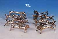 KONV. AUS 12 MESSERBäNKCHEN, FRANKREICH, UM 1900, METALL, SECHS VERSCH. TIERFORMEN: 2 WIDDER; 2 BäREN; 2 HASEN; 2 HUNDE; 2 STIERE;2 FüCHSE, ...