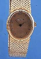 GLASHÜTTE SCHMUCKBANDUHR, MEDIUMGRößE, ME- TALLOVALGEH., INCL. BAND HARTVERG., EDELST.- BODEN AUFGEDR., ARMBANDUHRFORMWERK DER GUB, BASISKAL. ...