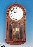 WANDUHR, JUNGHANS, UM 1930, EICHENHOLZGE- HäUSE VERZIERT, VERSILBERTES MESSINGZIFFER- BLATT (BERIEBEN), SKELET. ...