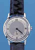 SEELAND/LANGENDORF HERRENARMBANDUHR, REF.-NR05094, SCHWEIZ UM 1945, METALL HARTVERCHR., EDELST.-BODEN GESCHR., UNGETR. LAGERW., LEDER-B. NEU, ...