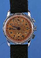 LETHAM ARMBANDCHRONOGRAPH, SCHWEIZ UM 1945, METALL NACH VERCHR., EDELST.-BODEN U. GLASR. GEDR., ORIG.-BLATT ALTERSBED. FARBL. GET., ...