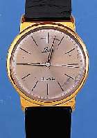 LACO HERRENARMBANDUHR ELECTRIC, DEUTSCHLAND UM 1967, METALL HARTVERG., EDELST.-BODEN EINGEDR., EINSCHALENAUSF., BATTERIEFACH U. ZEIGERST. AM ...