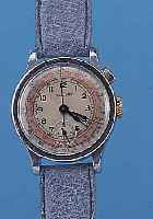 VENUS ARMBANDCHRONOGRAPH VIKING, SCHWEIZ UM 1939, METALL VERCHR., BODEN U. GLASR. GEDR., FüR DEN SCHWEDISCHEN MARKT, VERS. ORIG.-BLATT M. TELE- U. ...