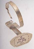 PATEK PHILIPPE DEKORATIONSUHRENSTäNDER, UM 1955, METALL VERS., ALTERSBED. FARBL. GET.,BESTELL-NR. 517