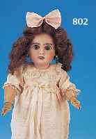 PORZELLANKOPFPUPPE, JUMEAU-TYP, FRANKREICH, UM 1890, H. 39 CM, BLAUE PAPERWEIGHTAUGEN,, OFFENER MUND MIT VIER ZäHNEN, GLIEDERKöRPER