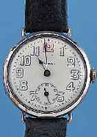 DOXA HERRENARMBANDUHR, REF.-NR. 1052557, SCHWEIZ UM 1920, NICKEL, SCHARNIERBODEN, LüNETTE MESSING VERCHR., ERS., PERF. EMAILBL.,SIGN., ROTE ...