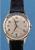 LONGINES HERRENARMBANDUHR AUTOMATIK, REF.- NR. 6063/3/75, SCHWEIZ UM 1949, GG 750/000, BODEN GEDR., BLATT VERS., L. FL. BEI 4, ZEN- TRALROTOR M. ...