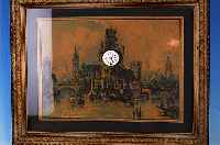 BILDERUHR MIT MUSIKSPIELWERK, DEUTSCH, UM 1880/1900, VERZIERTER VERGLASTER RAHMEN, PASSEPARTOUT, ÖLDRUCK, DARSTELLUND EINER STADTMIT FLUß, ...