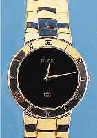 GUCCI HERRENARMBANDUHR, REF.-NR. 330M, SCHWEIZ UM 1994, METALL HARTVERG. INCL. ME- TALLBAND, MINERALFLACHGL., STD.-ZEICHEN AUF LüNETTE, ...