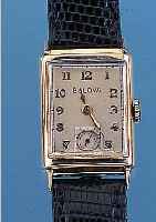 BULOVA HERRENARMBANDUHR, REF.-NR. 3180807, SCHWEIZ/USA UM 1949, GG 585/000, BODEN GEDR., KONKAVGL., BAND NEU, CREMEFARB. BLATT L. FL., KL. SEK. ...