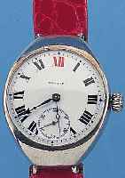 ZENITH ARMBANDUHR, SCHWEIZ UM 1920, NICKEL, BODEN GEDR., PERF. EMAILBL. SIGN., ROTE 12, GEBL. STAHLZEIGER, TEILW. ERS., 15 ST., RUND- ANKERW., ...