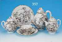 TEESERVICE, JAPAN, FUKAGAWA, UM 1910, EIERSCHALENPORZELLAN, REICH BEMALT MIT LAND- SCHAFTEN UND PAGODEN, GOLDSTAFFAGE, BESTEHEND AUS: KANNE, ...