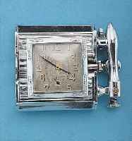 NOIRET BENZINFEUERZEUG M., EINGEBAUTER UHR, SCHWEIZ UM 1930, METALL VERCHR., FKT.-FäHIG, RUNDANKERW., ZIFFERBL. ALTERSBED. FARBL. GET.,6 ST., ...
