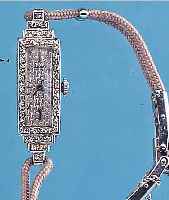 LONGINES DAMENFORMANKERWERK KALIBER 510, UM 1978, IN NEUTR. WG 750/000-GEH. VON CA. 1938, SCHARNIERBODEN, LüNETTE M. BRILLANTEN, ART DECO, ...
