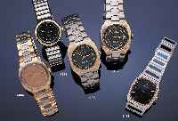 OMEGA HERRENARMBANDUHR SEAMASTER, SCHWEIZ UM1990, GG 750/000 MASSIV, INTARSIEN IN LüNETTE SOWIE ZWISCHENBANDGL. TITAN, UNSICHTB. ...