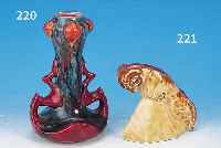 SKULPTUR, LIMOGES THARAUD, UM 1925-30, SPRINGENDER WIDDER, PORZELLAN, BRAUN VERLAU- FENDE LAUFGLASUREN, H. CA. 15 CM