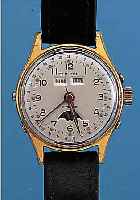 CLINTON HERRENARMBANDUHR VOLLKALENDER AUTOMA- TIK, SCHWEIZ UM 1955, METALL VERG., EDELST.-BODEN GESCHR., BER., KORREKTURDRüCKER SEITL. IM GEH. ...