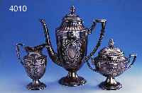 3-TEILIGES KAFFEESERVICE, WMF UM 1898/1900, LEGIERUNG BRITTANIA, BEST. AUS KAFFEEKANNE, ZUCKERDOSE UND SAHNEKäNNCHEN, INNENVERGOLDET, MIT ...