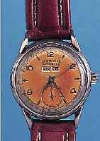 MARVIN HERRENARMBANDUHR, AUTODATE, REF.-NR. 361690, SCHWEIZ UM 1940, METALL VERCHR., EDELST.-BODEN GEDR., ORIG.-BLATT FL., VOLL- KALENDER ...