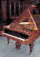 FLüGEL, JOSEF BAUMBACH WIEN, UM 1890, NUßBAUMGEHäUSE, ZWEI TASTEN DEFEKT, DREI TASTENBELäGE FEHLEN, EINE LAUBSäGEARBEIT ER- GäNZT, ...