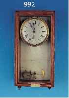ELEKTR. WANDUHR, FRANKREICH, UM 1920, ORIG. HOLZKASTEN, GLASABDECKUNG, WERK AUF MARMORRüCKWAND MONTIERT, METALLZIFFERBLATT VERSILBERT, ...