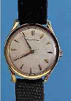 PORSCHE HERRENARMBANDUHR, PRäMIE FüR 100.000KM, DEUTSCHLAND UM 1960, GG 585/000, GLASR. GEDR., GUILL. U. VERS. BLATT, ALTERSBED. FARBL. ...