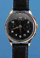 ALMADA ARMBANDCHRONOGRAPH, SCHWEIZ UM 1949, RG 750/000, ERS. BODEN IN RG 585/000, GLASR. GEDR., BLATT FL., 17 ST., HANDAUFZUGKAL. LANDERON 51, ...