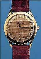 OMEGA HERRENARMBANDUHR CONSTELLATION CHRONO- METER, SCHWEIZ UM 1951, GG 750/000, BODEN WURDE NEUTR. ERS. (STERNWARTENSYMB. NACHTR. AUFGEL.), ...