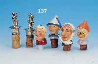 6 ZIERKORKEN, DEUTSCH, MITTE 20. JH., 4 X PORZELLAN, 2 X METALL, H. CA. 6 - 10 CM, Z. T. BEMALT