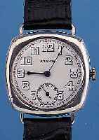 ARAMIS HERRENARMBANDUHR, SCHWEIZ UM 1925, 900ER SILBER, CARREE-CAMBRE, BODEN U. GLASR. GEDR., EMAILBL. FEIN HAARR., AUßEN ROT 13-24, KL. SEK., ...