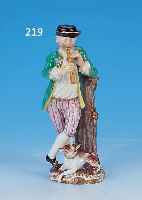 SKULPTUR, MEISSEN, UM 1860-80, PORZELLAN, FLöTENSPIELER MIT HUND, BUNTE BEMALUNG, GOLD- STAFFAGE, H. 15 CM, L. REST.