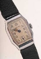 BIFORA HERRENARMBANDUHR, DEUTSCHLAND UM 1938, METALL VERCHR., EDELST.-BODEN GEDR., 2-FARB. VERS. ORIG.-BLATT, LEUCHTSTD.-ZEICHEN U. ZEIGER ...