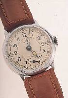 GEBRÜDER THIEL RULA HERRENARMBANDUHR, DEUTSCHLAND UM 1940, METALL VERCHR., GLASR. GEDR., AUßER LEDERB. ORIG.-ZUSTAND, LEUCHTFAR-BE ...