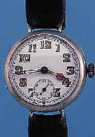 HERRENARMBANDUHR, SCHWEIZ UM 1925, NICKEL, BODENSCHARNIER, GLASR. GEDR., ORIG.-EMAILBL. ZUM RAND ZU UNTER GLASR. BESCH., ORIG.-LEUCHT-MASSE ...