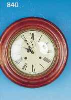 WANDUHR, AMERIKA, UM 1910, RUNDER PROFIL- LIERTER HOLZRAHMEN, GLASDECKEL, SKEL. MESSING-PLATINENWERK, SOG. AMERIKANERWERK, INT. ...