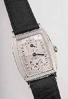 RECORD HERRENARMBANDUHR DOCTORS WATCH REGULA- TEUR, SCHWEIZ UM 1999, EDELST., TONNEAUFORM POL., BODEN GEDR., MINERALFLACHGL., TYP. AUS- EINANDERGEZ. ...