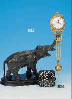 SCHWINGPENDELUHR (MYSTERIEUSE), JUNGHANS, UM 1910, ELEFANT AUS BRüNIERTER BRONZE AUF HOLZSOCKEL, HäLT MIT RüSSEL DIE HIN- UND HER- ...