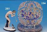 PORZELLANFIGUR, ROYAL DUX, 20. JHD, ENTWURF 1925-30, AUSFORMUNG SPäTER, SCHLANGENBESCHWö- RERIN, BUNT BEMALT, FLöTE ERGäNZT, GOLDSTAF- FAGE, H. ...
