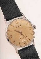 ETERNA HERRENARMBANDUHR ANTIMAGNETIK, SCHWEIZ UM 1953, EDELST., BODEN GESCHR., ORIG.-BLATT ALTERSBED. FARBL. GET., HANDAUFZUGKAL. 1274, ...