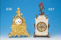 PENDULE, FRANKREICH, UM 1850, VERZIERTER UNDVERGOLDETER BRONZEGUß, SOCKEL MIT GEOMETR. BANDWERK UND FRüCHTEN, UHR IN STILISIERTEM FELSBLOCK, ...