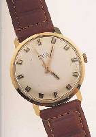 BWC HERRENARMBANDUHR, REF.-NR. 848320, SCHWEIZ UM 1968, GG 585/000, BODEN GEDR., MATT VERS. BLATT, ZUM RAND L. FL., AUFGES. ...